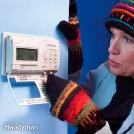 Woman cold needing furnace repair